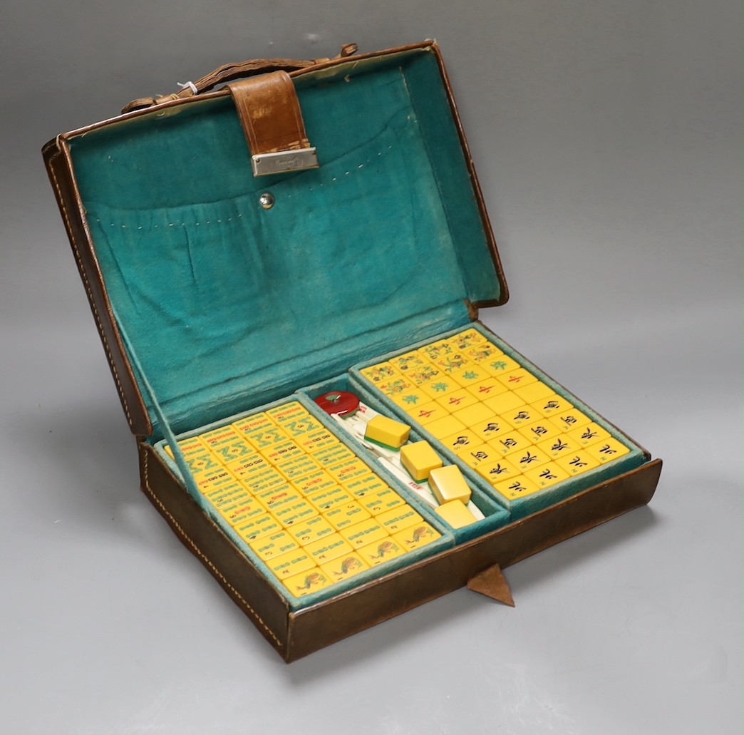 A 1920's leather travelling mahjong set